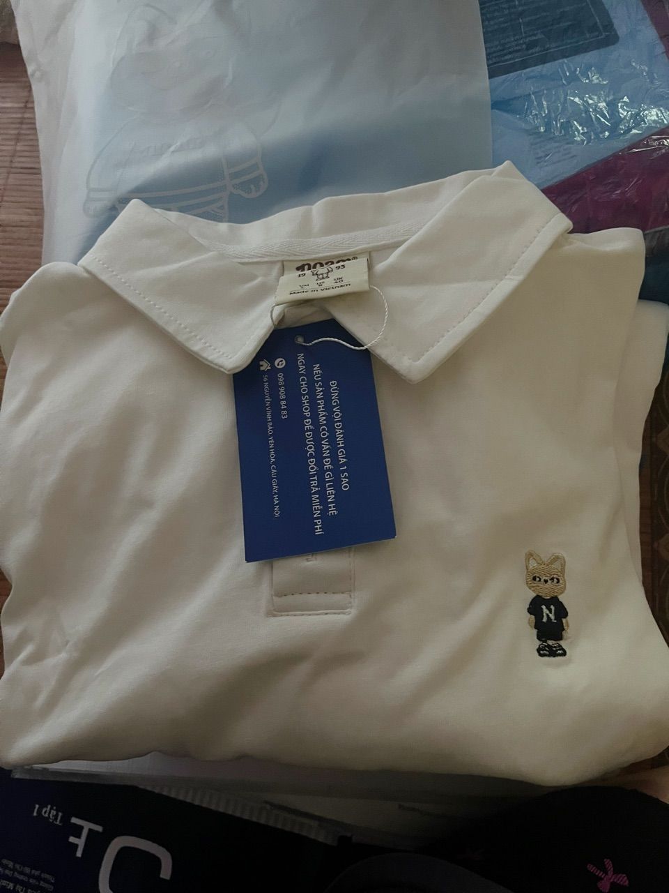 Khách mặc Áo Polo Form rộng NOAM Teeny Homies Cotton 100% mềm mịn vượt trội - Màu đen/ trắng