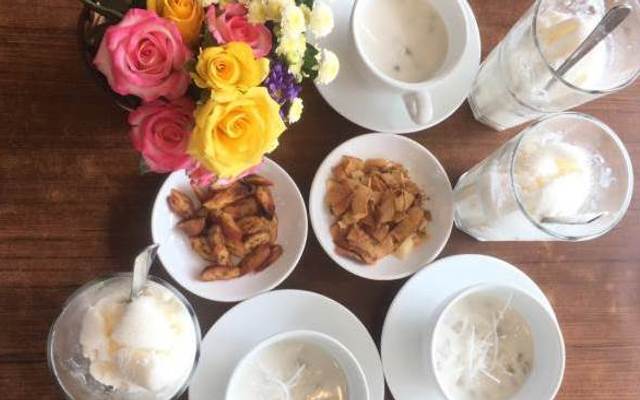 Bà Vui - Sữa Chua Trân Châu - Quang Trung